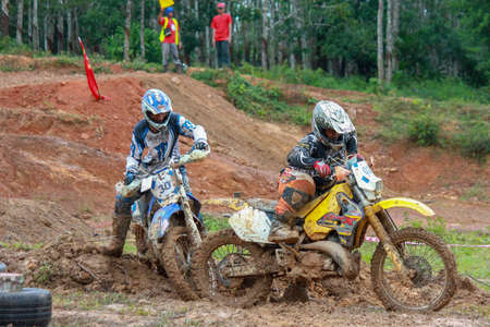 Alor Setar kedah Malaysia, 8 November 2015 -Unidentified motocross riders perform on the competes at Malaysia motocross championship 2015 first round onのeditorial素材