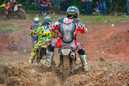 Alor Setar kedah Malaysia, 8 November 2015 -Unidentified motocross riders perform on the competes at Malaysia motocross championship 2015 first round onのeditorial素材