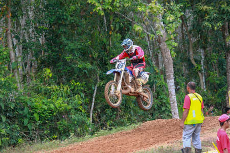 Alor Setar kedah Malaysia, 8 November 2015 -Unidentified motocross riders perform on the competes at Malaysia motocross championship 2015 first round onのeditorial素材