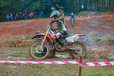 Alor Setar kedah Malaysia, 8 November 2015 -Unidentified motocross riders perform on the competes at Malaysia motocross championship 2015 first round onのeditorial素材