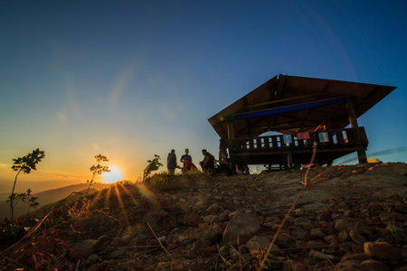 kedah, Malaysia - December 13, 2019: On Friday, Saturday and Sunday, many residents around Bukit Laka, Changlun climb the hill to see the beautiful scenery in the morning and sunrise.のeditorial素材