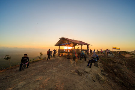 kedah, Malaysia - December 13, 2019: On Friday, Saturday and Sunday, many residents around Bukit Laka, Changlun climb the hill to see the beautiful scenery in the morning and sunrise.のeditorial素材