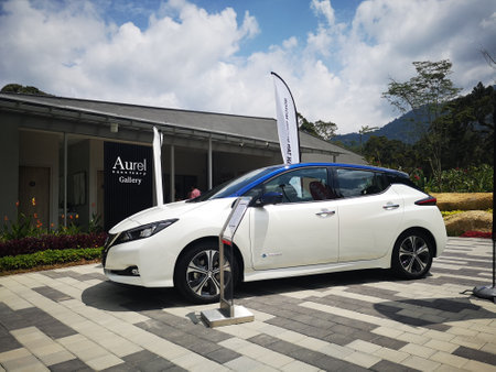 Bukit Tinggi Pahang,Malaysia - 24 Julai, 2019: Metallic White Nissan Leaf at Aurel Sanctuary Galery Bentong Pahang, compact five-door hatchback electric car manufactured by Nissan.のeditorial素材