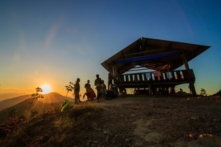 kedah, Malaysia - December 13, 2019: On Friday, Saturday and Sunday, many residents around Bukit Laka, Changlun climb the hill to see the beautiful scenery in the morning and sunrise.のeditorial素材
