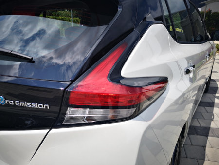 Bukit Tinggi Pahang,Malaysia - 24 Julai, 2019: Metallic White Nissan Leaf at Aurel Sanctuary Galery Bentong Pahang, compact five-door hatchback electric car manufactured by Nissan.のeditorial素材