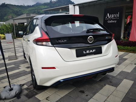 Bukit Tinggi Pahang,Malaysia - 24 Julai, 2019: Metallic White Nissan Leaf at Aurel Sanctuary Galery Bentong Pahang, compact five-door hatchback electric car manufactured by Nissan.のeditorial素材
