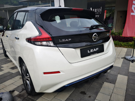 Bukit Tinggi Pahang,Malaysia - 24 Julai, 2019: Metallic White Nissan Leaf at Aurel Sanctuary Galery Bentong Pahang, compact five-door hatchback electric car manufactured by Nissan.のeditorial素材