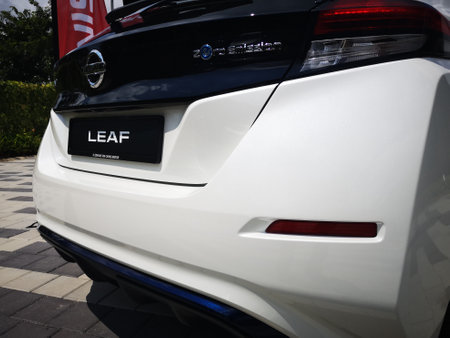 Bukit Tinggi Pahang,Malaysia - 24 Julai, 2019: Metallic White Nissan Leaf at Aurel Sanctuary Galery Bentong Pahang, compact five-door hatchback electric car manufactured by Nissan.のeditorial素材