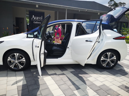 kedah, Malaysia - December 13, 2019: Hiker enjoying nature on top of mountain with sunrise, many residents around Bukit Laka, Changlun climb the hill to see the beautiful scenery in the morningのeditorial素材