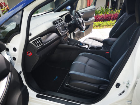 Bukit Tinggi Pahang,Malaysia - 24 Julai, 2019: Metallic White Nissan Leaf at Aurel Sanctuary Galery Bentong Pahang, compact five-door hatchback electric car manufactured by Nissan.のeditorial素材