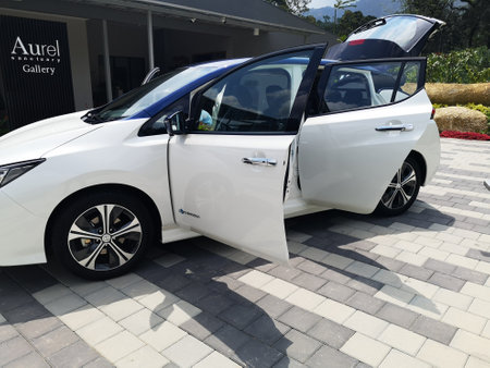 Bukit Tinggi Pahang,Malaysia - 24 Julai, 2019: Metallic White Nissan Leaf at Aurel Sanctuary Galery Bentong Pahang, compact five-door hatchback electric car manufactured by Nissan.のeditorial素材