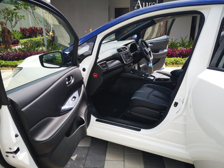 Bukit Tinggi Pahang,Malaysia - 24 Julai, 2019: Metallic White Nissan Leaf at Aurel Sanctuary Galery Bentong Pahang, compact five-door hatchback electric car manufactured by Nissan.のeditorial素材
