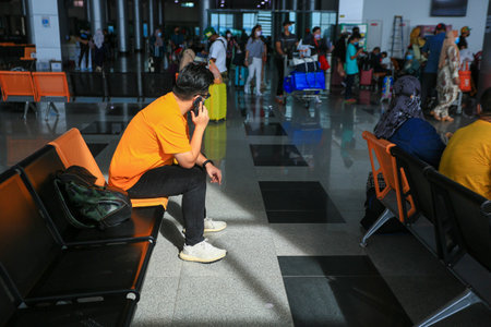 LANGKAWI,KEDAH-DECEMBER 23 2020: Crowd of unrecognizable local tourist wearing surgical mask for prevent coronavirus Outbreak  at Langkawi Jetty Point Kuahのeditorial素材