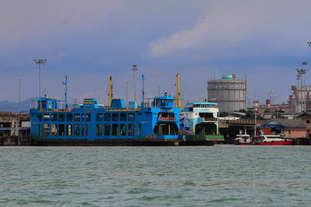 PENANG, MALAYSIA - 19 DECEMBER 2020 - Penang Cargo Port. Penang Port's relationship with containers started back in 1974 when the first container was discharged at Butterworth Wharvesのeditorial素材