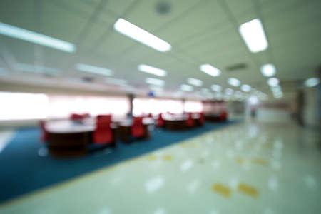 Blurred image, business office interior with bright light for backgrounds