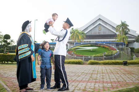 Sintok, Kedah, Malaysia - Circa October, 2019 - Asian university student celebrating graduation outdoorのeditorial素材