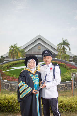 Sintok, Kedah, Malaysia - Circa October, 2019 - Asian university student celebrating graduation outdoorのeditorial素材