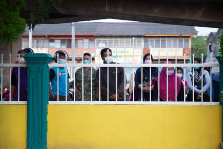 Alor Setar Kedah,Malaysia-March 1,2021:The first day of the school session for preschool students in Alor Setar during the Covid-19 pandemic season is hitting the world.のeditorial素材