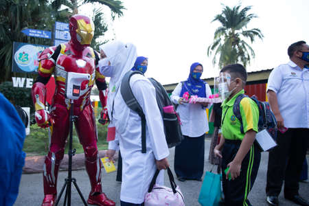 Alor Setar Kedah,Malaysia-March 1,2021:The first day of the school session for preschool students in Alor Setar during the Covid-19 pandemic season is hitting the world.のeditorial素材