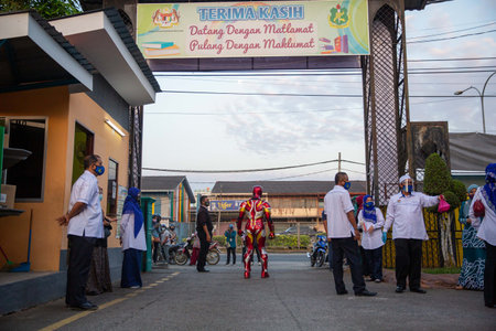 Alor Setar Kedah,Malaysia-March 1,2021:The first day of the school session for preschool students in Alor Setar during the Covid-19 pandemic season is hitting the world.のeditorial素材