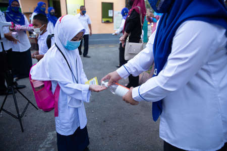 Alor Setar Kedah,Malaysia-March 1,2021:The first day of the school session for preschool students in Alor Setar during the Covid-19 pandemic season is hitting the world.のeditorial素材