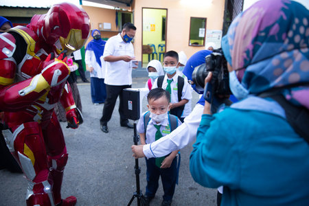 Alor Setar Kedah,Malaysia-March 1,2021:The first day of the school session for preschool students in Alor Setar during the Covid-19 pandemic season is hitting the world.のeditorial素材