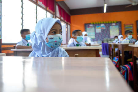 Alor Setar Kedah,Malaysia-March 1,2021:The first day of the school session for preschool students in Alor Setar during the Covid-19 pandemic season is hitting the world.のeditorial素材