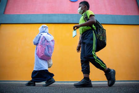 Alor Setar Kedah,Malaysia-March 1,2021:The first day of the school session for preschool students in Alor Setar during the Covid-19 pandemic season is hitting the world.のeditorial素材