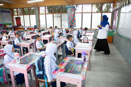 Alor Setar Kedah,Malaysia-March 1,2021:The first day of the school session for preschool students in Alor Setar during the Covid-19 pandemic season is hitting the world.のeditorial素材