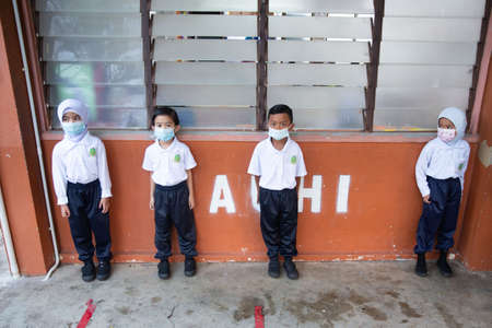 Alor Setar Kedah,Malaysia-March 1,2021:The first day of the school session for preschool students in Alor Setar during the Covid-19 pandemic season is hitting the world.のeditorial素材