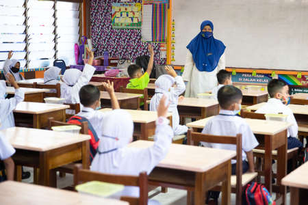 Alor Setar Kedah,Malaysia-March 1,2021:The first day of the school session for preschool students in Alor Setar during the Covid-19 pandemic season is hitting the world.のeditorial素材