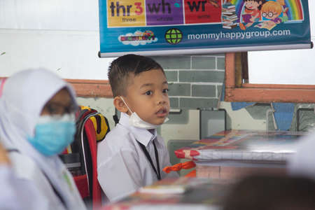 Alor Setar Kedah,Malaysia-March 1,2021:The first day of the school session for preschool students in Alor Setar during the Covid-19 pandemic season is hitting the world.のeditorial素材