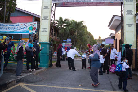 Alor Setar Kedah,Malaysia-March 1,2021:The first day of the school session for preschool students in Alor Setar during the Covid-19 pandemic season is hitting the world.のeditorial素材
