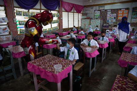 Alor Setar Kedah,Malaysia-March 1,2021:The first day of the school session for preschool students in Alor Setar during the Covid-19 pandemic season is hitting the world.のeditorial素材
