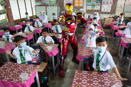 Alor Setar Kedah,Malaysia-March 1,2021:The first day of the school session for preschool students in Alor Setar during the Covid-19 pandemic season is hitting the world.のeditorial素材