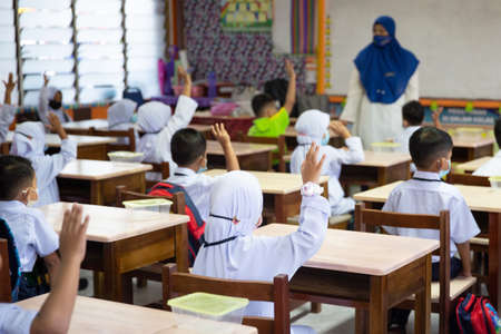 Alor Setar Kedah,Malaysia-March 1,2021:The first day of the school session for preschool students in Alor Setar during the Covid-19 pandemic season is hitting the world.のeditorial素材