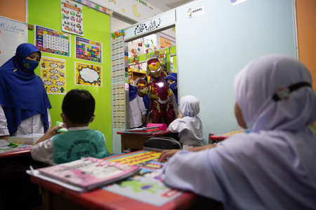 Alor Setar Kedah,Malaysia-March 1,2021:The first day of the school session for preschool students in Alor Setar during the Covid-19 pandemic season is hitting the world.のeditorial素材