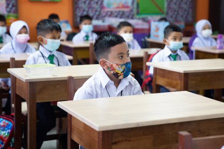Alor Setar Kedah,Malaysia-March 1,2021:The first day of the school session for preschool students in Alor Setar during the Covid-19 pandemic season is hitting the world.のeditorial素材