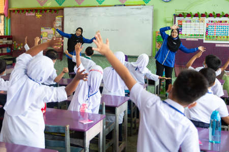 Alor Setar Kedah,Malaysia-March 1,2021:The first day of the school session for preschool students in Alor Setar during the Covid-19 pandemic season is hitting the world.のeditorial素材