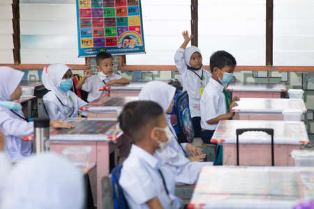 Alor Setar Kedah,Malaysia-March 1,2021:The first day of the school session for preschool students in Alor Setar during the Covid-19 pandemic season is hitting the world.のeditorial素材