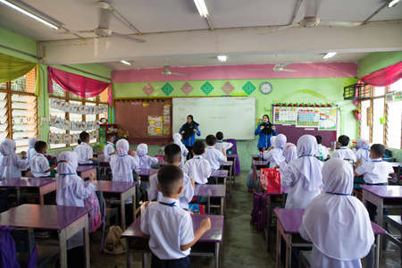 Alor Setar Kedah,Malaysia-March 1,2021:The first day of the school session for preschool students in Alor Setar during the Covid-19 pandemic season is hitting the world.のeditorial素材