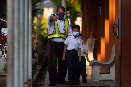 Alor Setar Kedah,Malaysia-March 1,2021:The first day of the school session for preschool students in Alor Setar during the Covid-19 pandemic season is hitting the world.のeditorial素材