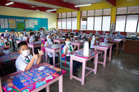 Alor Setar Kedah,Malaysia-March 1,2021:The first day of the school session for preschool students in Alor Setar during the Covid-19 pandemic season is hitting the world.のeditorial素材