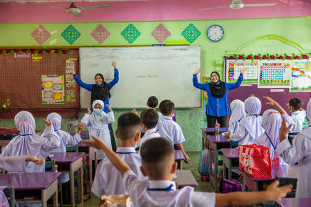 Alor Setar Kedah,Malaysia-March 1,2021:The first day of the school session for preschool students in Alor Setar during the Covid-19 pandemic season is hitting the world.のeditorial素材