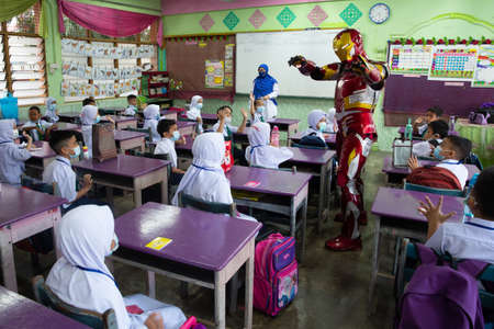 Alor Setar Kedah,Malaysia-March 1,2021:The first day of the school session for preschool students in Alor Setar during the Covid-19 pandemic season is hitting the world.のeditorial素材