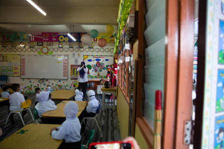 Alor Setar Kedah,Malaysia-March 1,2021:The first day of the school session for preschool students in Alor Setar during the Covid-19 pandemic season is hitting the world.のeditorial素材