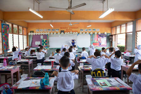 Alor Setar Kedah,Malaysia-March 1,2021:The first day of the school session for preschool students in Alor Setar during the Covid-19 pandemic season is hitting the world.のeditorial素材