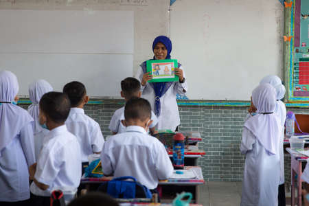 Alor Setar Kedah,Malaysia-March 1,2021:The first day of the school session for preschool students in Alor Setar during the Covid-19 pandemic season is hitting the world.のeditorial素材