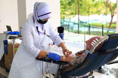 Kuala Lumpur, Malaysia 29 July 2020; locals donate blood to the national blood bank,のeditorial素材