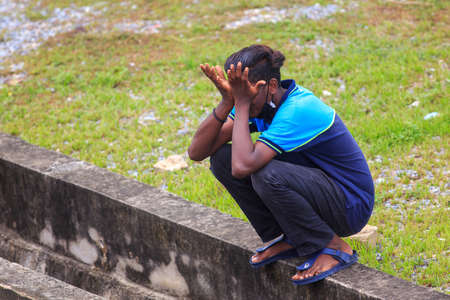 Alor Setar, Kedah, Malaysia - May 20, 2021 : Private clinic make a Swab test in  to local citizen due to Covid-19 positive cases raised up. Selective focus image with noise effectのeditorial素材